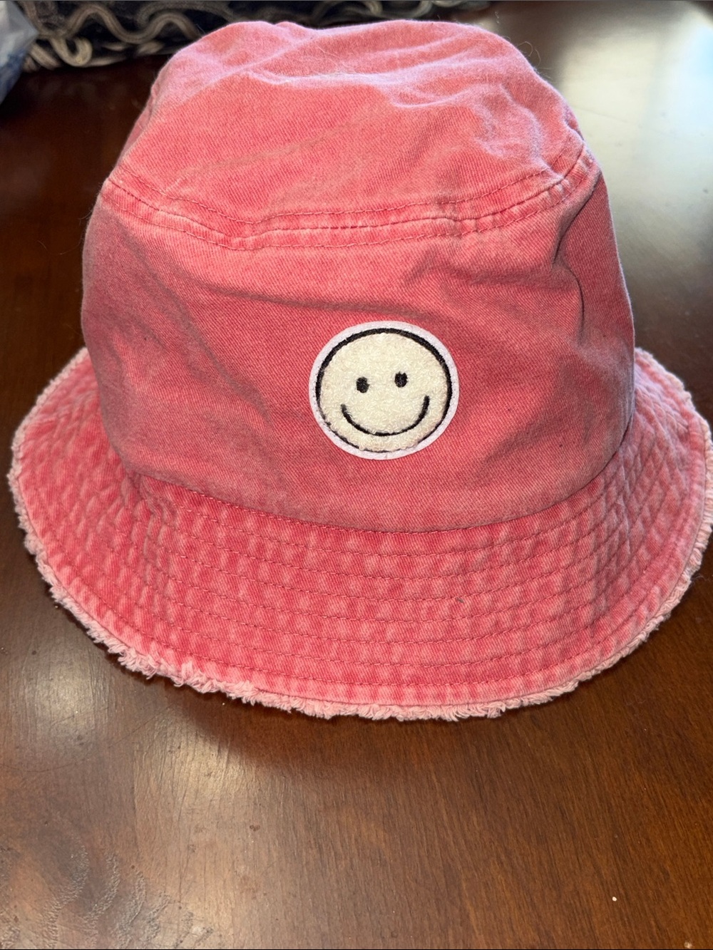David and Young Pink Smiley Face Bucket Hat